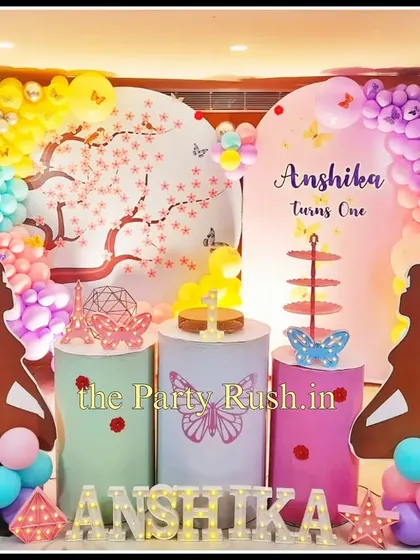 Anshika's "Fairy One" birthday was a magical celebration with pastel colors and fairy wing silhouettes. The cherry blossom backdrop adds a beautiful, delicate touch to the enchanting theme.