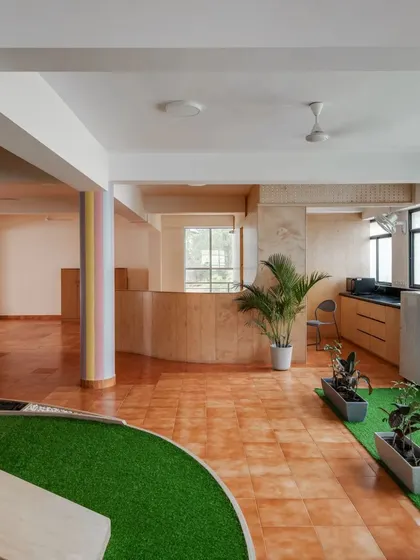 A look at our indoor sensory path and kitchen area. The space is designed to flow, allowing children to move freely between different types of activities.