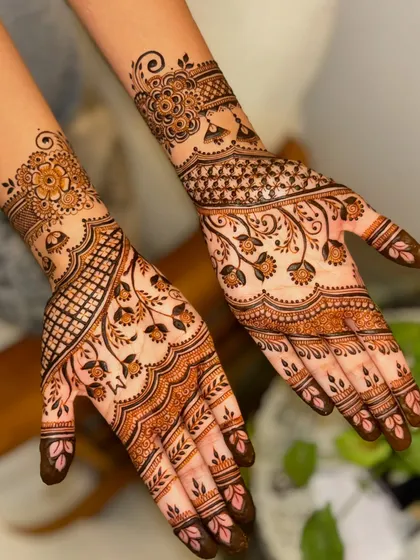 This fusion design was for a wonderful client from Japan. It blends traditional Indian floral patterns with a modern, flowing style, making it a perfect choice for a wedding guest.