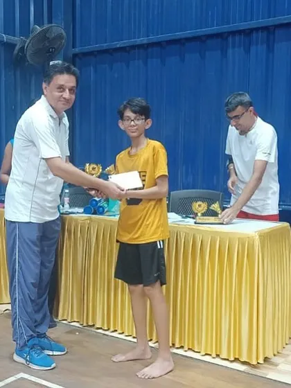 Hrishant receiving his runners-up trophy for the under-15 boys' category at the TSG Shuttle Storm tournament. We are proud of his hard-fought performance.
