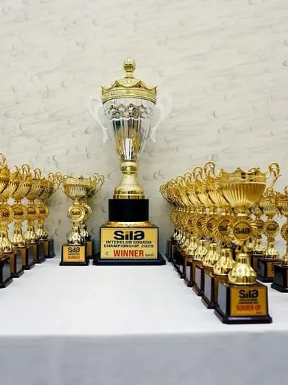 The ultimate prize. The trophies for the SILA Inter-Club Squash Championship waiting for their champions, representing the prestige and scale of our tournaments.