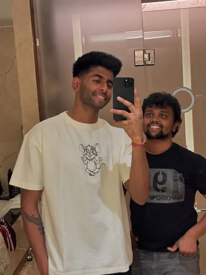 A smiling selfie with Mayank Yadav.