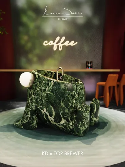 Introducing Monster 3.0, a sculptural coffee bar concept carved from a single piece of dramatic green marble. It’s designed to be a functional centerpiece, complete with an integrated coffee brewer, proving that even everyday rituals can be artistic.