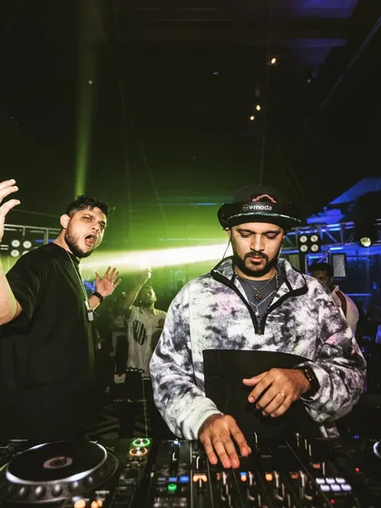 Hyping the crowd alongside another DJ. Back-to-back sets are a great way to bring diverse styles and keep the energy dynamic.