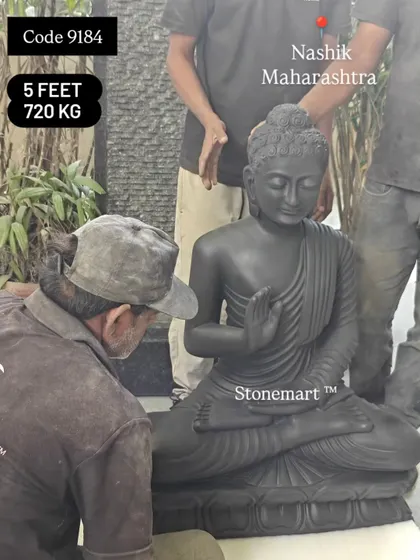 A 5-foot, 720 kg black marble Buddha statue being prepared by my team. The scale of this piece requires careful handling.