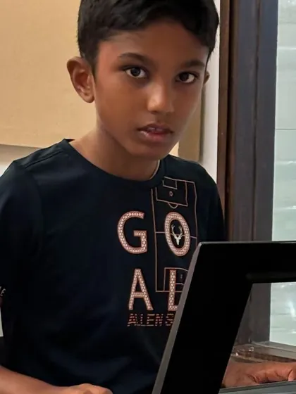 A young student focuses on his keyboard lesson. We create a supportive atmosphere for beginners to feel comfortable and confident.