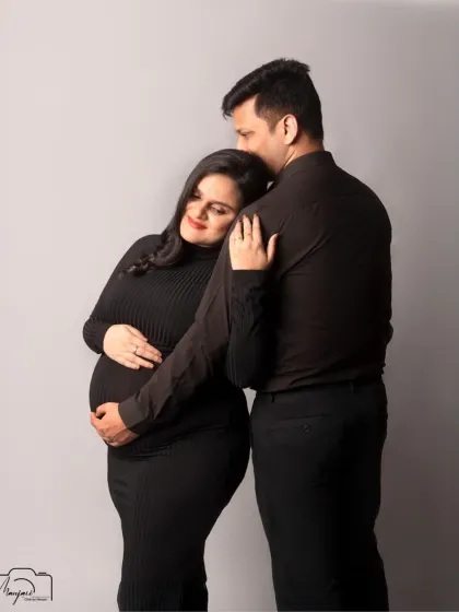 A tender and protective embrace. This classic pose is beautifully captured in a simple and modern style.