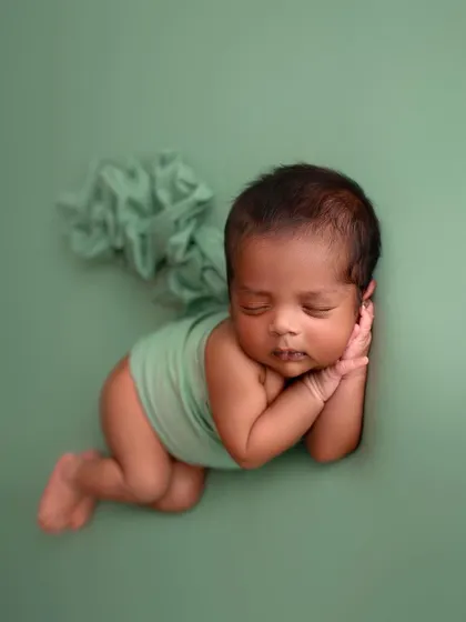 Another look at this classic pose. I love how peaceful and content babies look when posed this way.