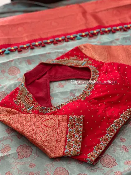 Another view of the red bird motif blouse.
