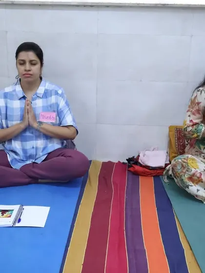 Students in our meditation training program hold Anjali Mudra (Prayer Pose). This gesture helps to center the mind and cultivate a sense of gratitude and reverence for the practice.