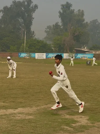 A fielder running in to celebrate a wicket.