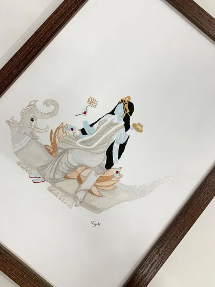 A closer look at the artwork, showing the subtle texture of the paper and the rich colors, all clearly visible through the museum glass.