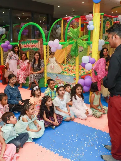 A magician always brings an extra layer of wonder to a party. The children at Sofiya's Frozen-themed celebration were captivated by the enchanting magic show.