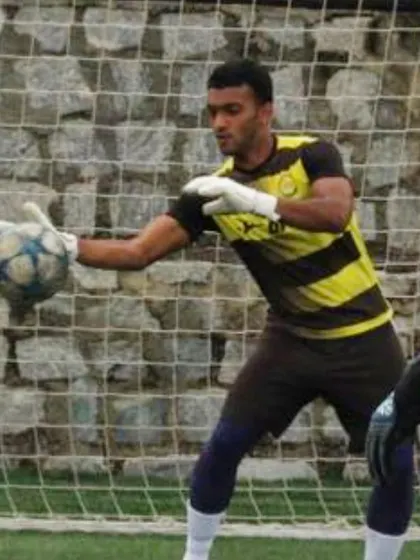 Akash Kola during a goalkeeping drill. His dedication to training was key to his success.