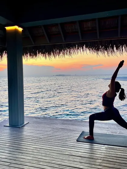 Grounded power in Warrior I pose during the golden hour. This foundational pose builds strength in the lower body and opens the chest, helping you feel rooted and expansive at the same time.
