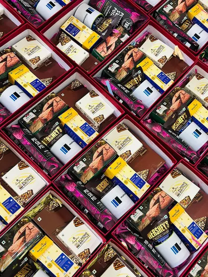 A tightly packed frame of corporate gift boxes, emphasizing the sheer volume and consistency of a large order.