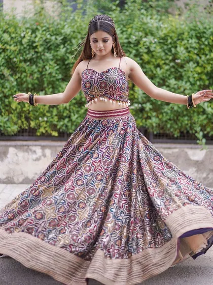 Another dynamic shot of the printed lehenga, capturing the movement and flow of the lightweight skirt.
