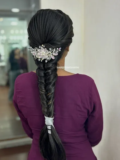 This image shows the hairstyle in a different lighting, highlighting the shine and health of the hair, a result of avoiding harsh crimping.