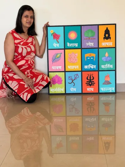 I am so proud of this large Marathi months calendar, a unique piece of decor that celebrates our culture. Each of the twelve months is represented by a colorful, handcrafted icon, making it a beautiful and educational addition to any wall.