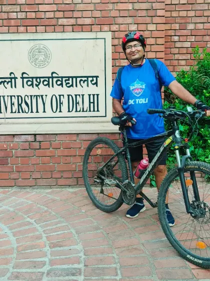 A rider posing in front of the University of Delhi sign during our Wednesday escape to the Ridge. It's a great spot for a green, refreshing ride.