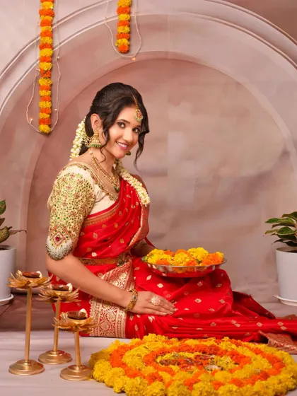 Another happy moment from the Diwali shoot, with my client glowing in the festive setup.