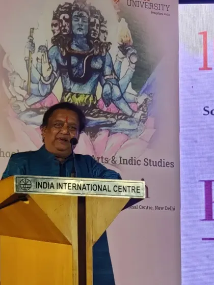 Guru ji Pt. Jai Kishan Maharaj ji speaking at an event hosted by Reva University, sharing his insights on classical dance.
