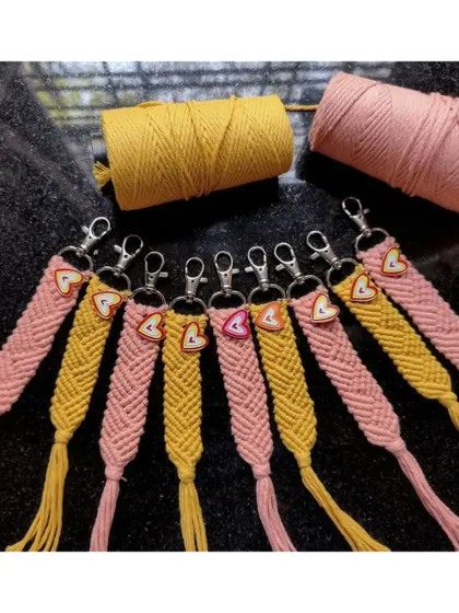 A batch of our handmade macrame keychains with initial heart beads. These are perfect as party favors or as a small, personalized gift for friends and loved ones.