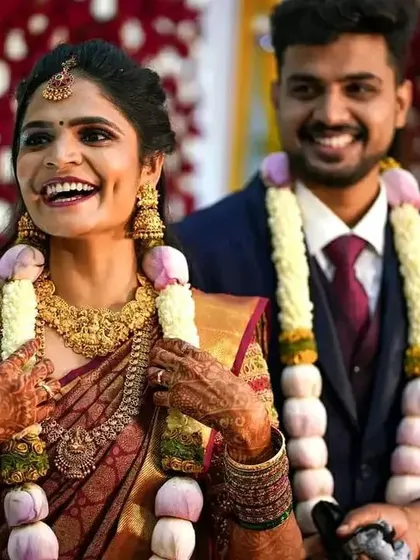 A happy moment from a wedding reception. I love creating looks that allow my brides to feel comfortable and express their joy freely, with makeup and hair that stay flawless throughout the event.