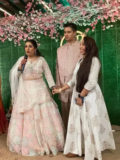 A moment of gratitude on stage. I love being there to support my clients on their big day.