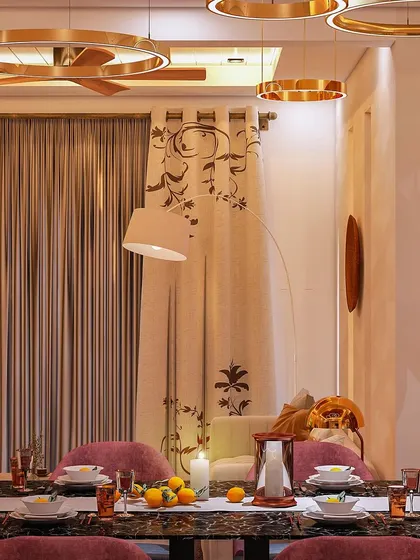 This render showcases a cozy dining setting with a statement floor lamp and patterned curtains. The focus is on creating a warm and inviting ambiance with layered lighting and soft textiles.