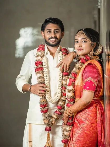Posing for the camera after the ceremony. The groom's makeup is designed to be long-lasting and photo-friendly, so he looks just as fresh hours later.
