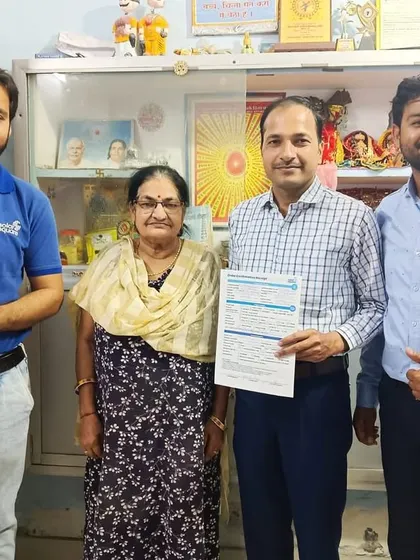 Our team with a family, finalizing their solar agreement. We are committed to transparency and trust.