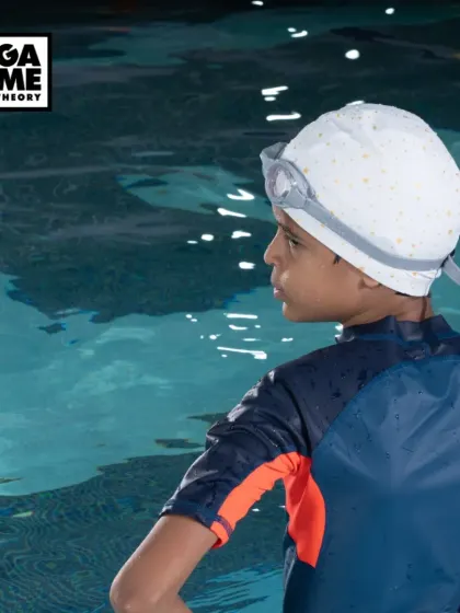 Escape the summer heat! A young swimmer looks ready to jump into our cool, refreshing pool.