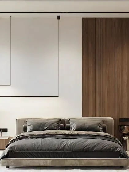 Minimalism meets warmth in this modern bedroom. I used a combination of clean white walls, rich wood panelling, and sleek pendant lights to design a space that is simple, yet incredibly cozy and inviting.