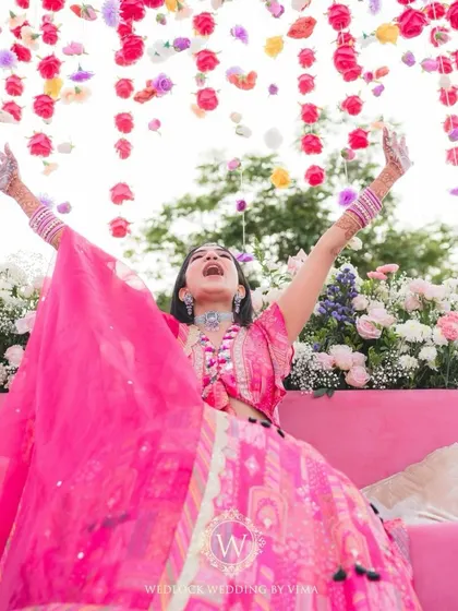 A fun dance-off at a vibrant Mehendi party. We believe every wedding event should be filled with music, laughter, and plenty of dancing.