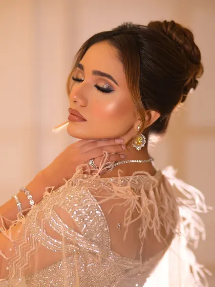 The soft lighting in this shot creates a dreamy, ethereal effect, perfect for capturing the magic of an evening event.