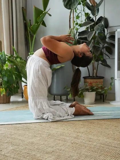 Ustrasana (Camel Pose), a deep heart-opener that requires trust and surrender.