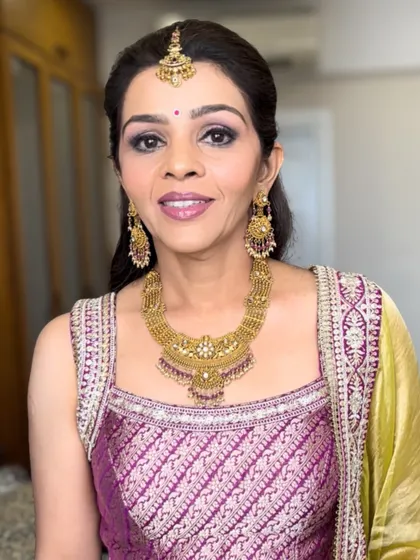 A beautiful portrait showcasing the final look. The makeup enhances her natural grace, proving that soft glam is perfect for creating a timeless and sophisticated appearance at any age.