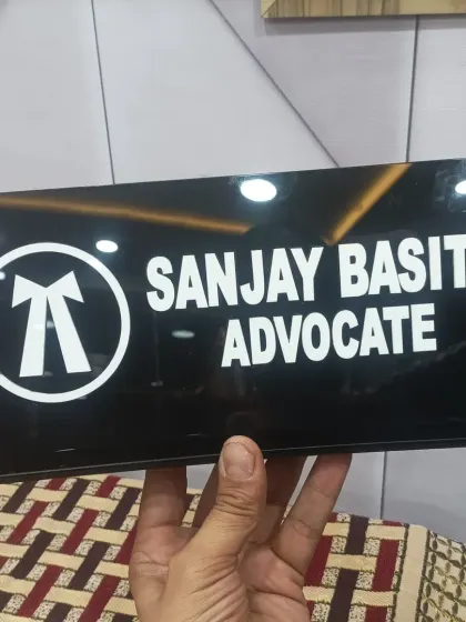 I also create professional nameplates for desks. This acrylic sign for an advocate is sleek and modern.