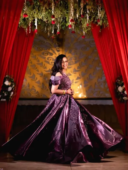 A beautiful portrait of the bride-to-be, smiling brightly in her stunning engagement gown.