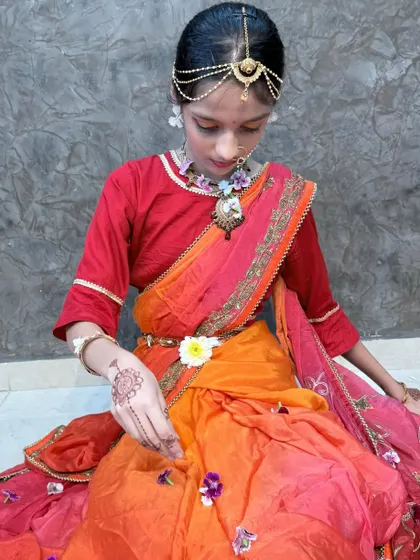 A close-up of the Janmashtami drape, showing the neat pleats and how the pallu is secured.