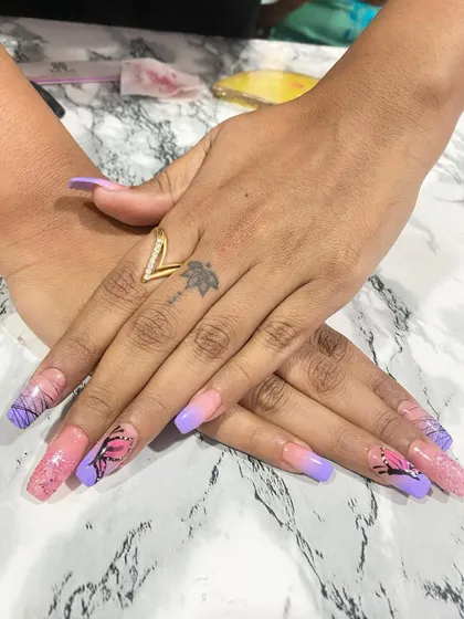 Hand-painted butterfly wings are a favorite among my clients. This design shows the detail I put into each piece, from the color blending in the ombré background to the fine black lines of the butterfly art.