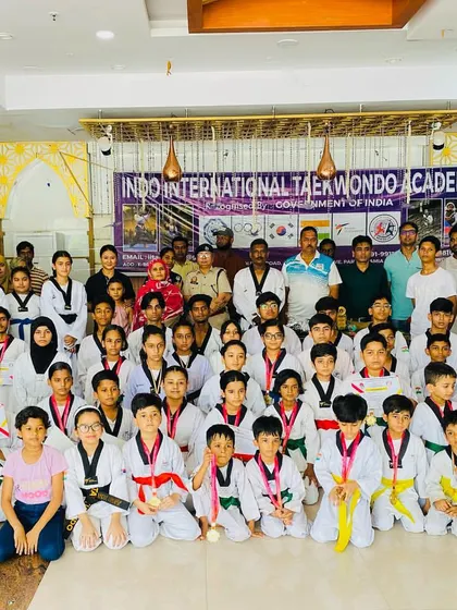 I am incredibly proud of my students' achievements. This photo captures a medal and belt distribution ceremony, an event honored by the presence of the ACP of the Crimes Against Women Cell, which shows the official recognition of our training's importance.