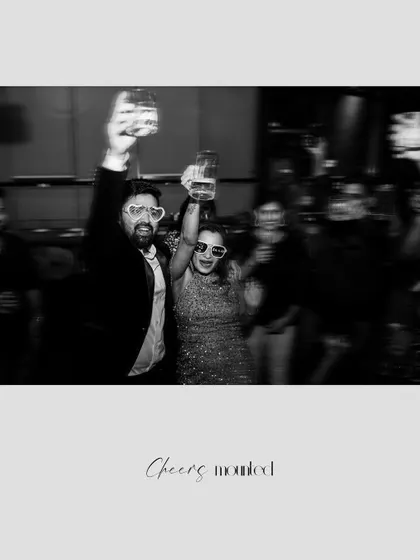 A duplicate of the fun "cheers" photo, perfect for capturing the party atmosphere.