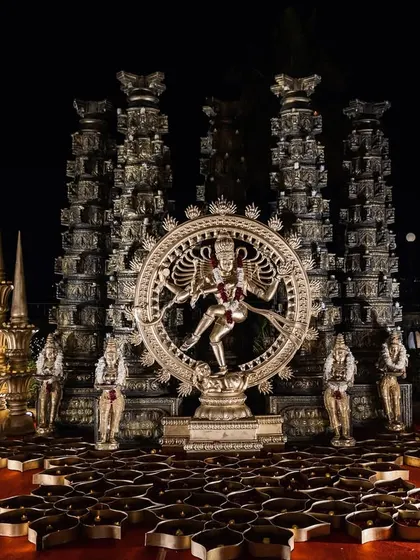 A frontal view of the magnificent Nataraja decor element, surrounded by diyas, adding a touch of divinity and tradition to the celebration.