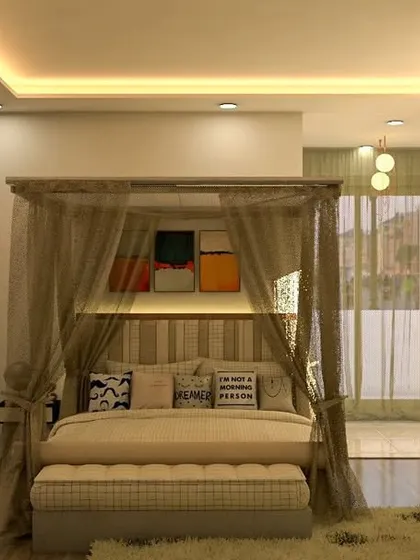 A romantic and dreamy bedroom design with a four-poster bed draped in sheer fabric. The soft lighting and neutral color palette create a serene and inviting ambiance.