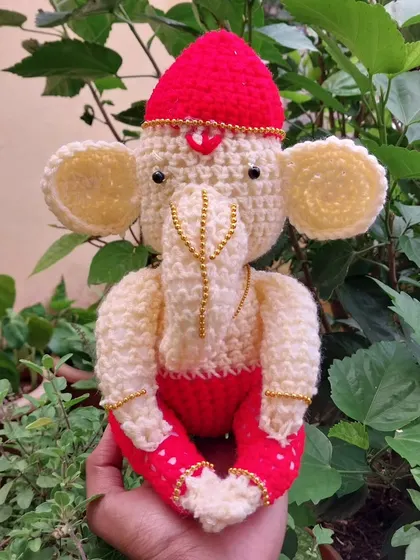 My handmade crochet Ganesha doll, perfect for your car dashboard, desk, or as a thoughtful gift. I've carefully added small details like the golden jewelry to make this amigurumi extra special.