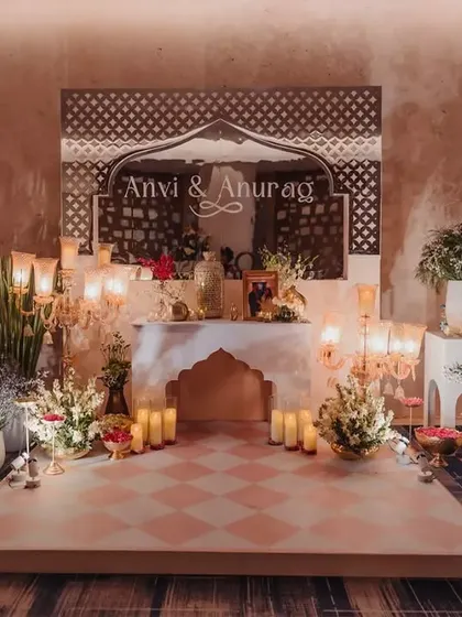 This welcome corner set the tone for modern royalty. We used a custom mirror with the couple's names, traditional candelabras, and lush florals to transport guests into a bygone era of romance.