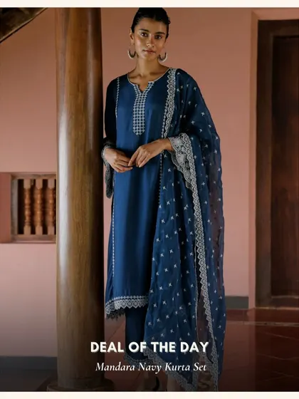 The Mandara Navy Kurta Set is a sophisticated and timeless piece. The deep navy blue is complemented by delicate white embroidery for a classic look.