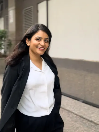A bright smile on a busy day. Maintaining a positive and approachable attitude is important, even when dealing with serious legal matters.